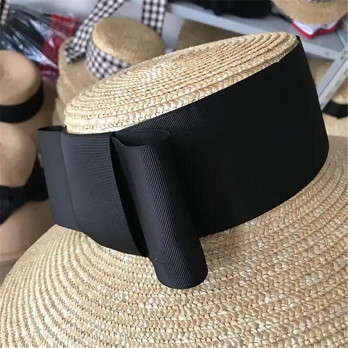 202606-nu Nouveauté chapeau de soleil d'été chic en paille tressée à large bord avec grand nœud