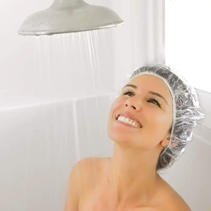 100/200 pièces de bonnets de douche jetables transparents