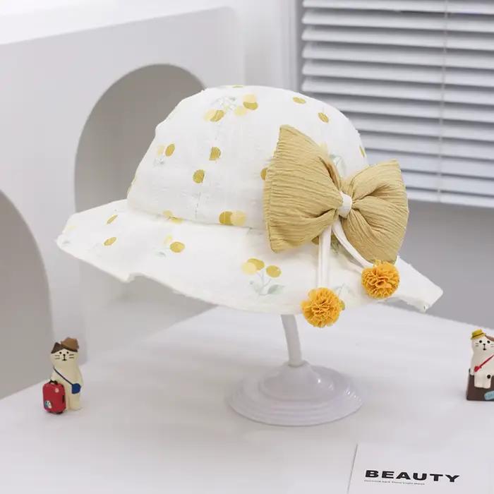 Chapeau de soleil kawaii pour enfants avec protection uv nœud papillon casquette à large bord pour garçons et filles occasions spéciales été vacances