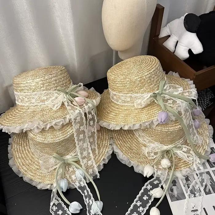 Chapeau de paille à large bord avec nœud en dentelle